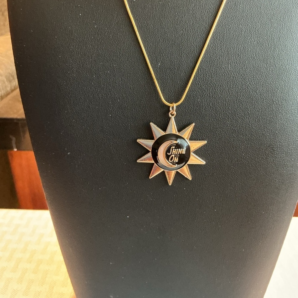 Celestial Sunburst Gold Tone Pendant Necklace